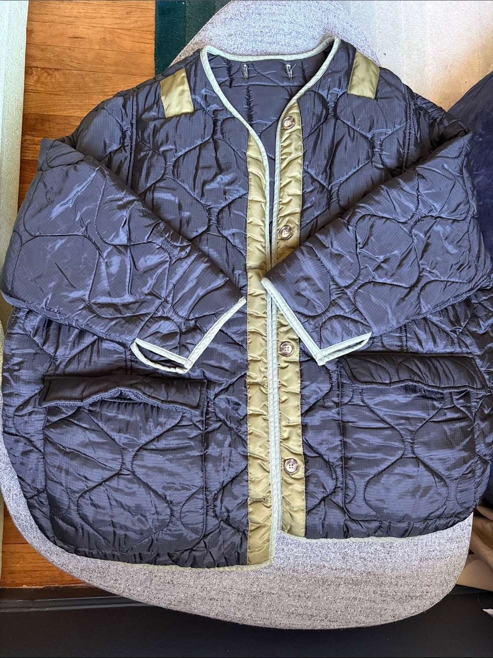 The Frankie Shop Quilted Puffer Jacket in Charcoal with Olive Trim